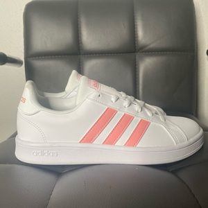 Pink and white Adidas